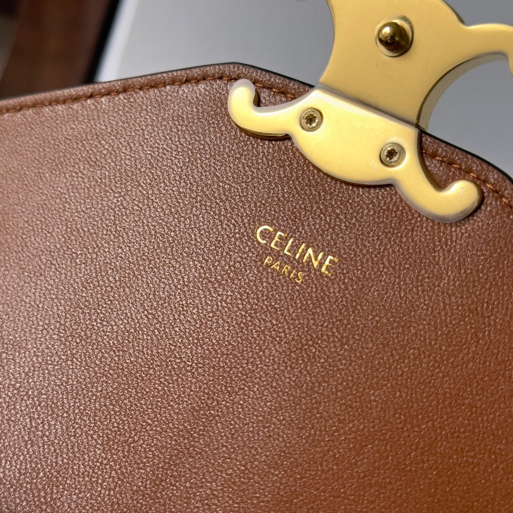 CELINE 25S WALLET MARGO 22MM IN BLACK TRIOMPHE CANVAS AND BROWN CALFSKIN