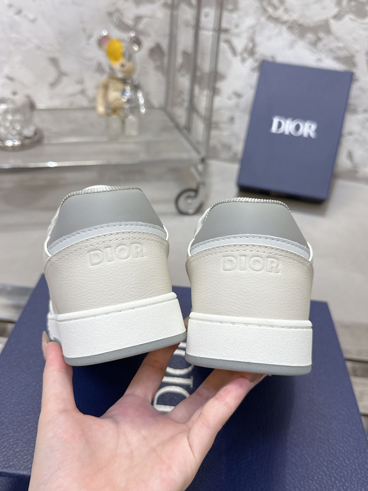 DIOR 25S B27 UPTOWN LOW-TOP SNEAKERS IN WHITE MIX GREY CALFSKIN STYLE 1