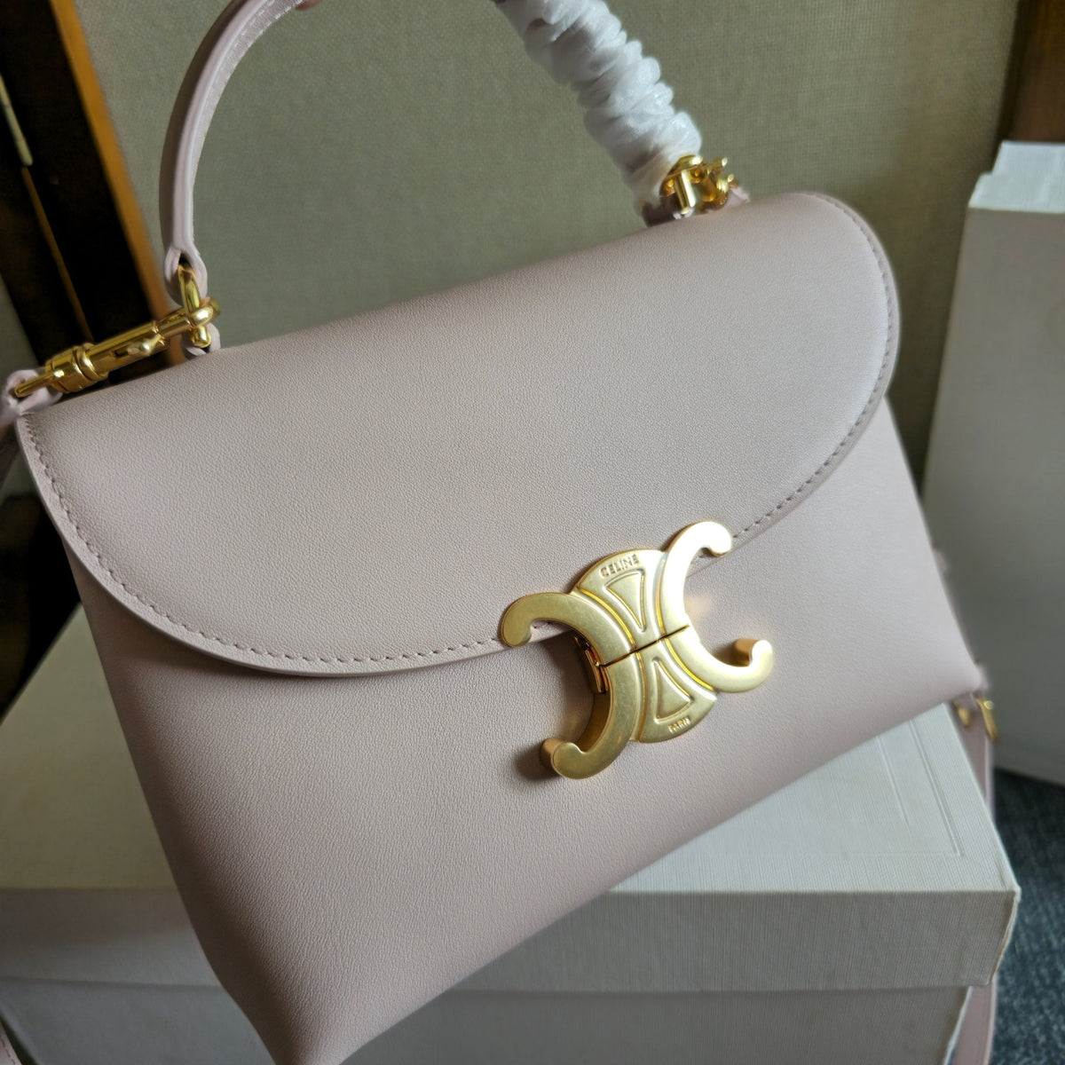 CELINE 25S NINO BAG 20MM IN LIGHT PINK GRAINED CALFSKIN GOLD HARDWARE