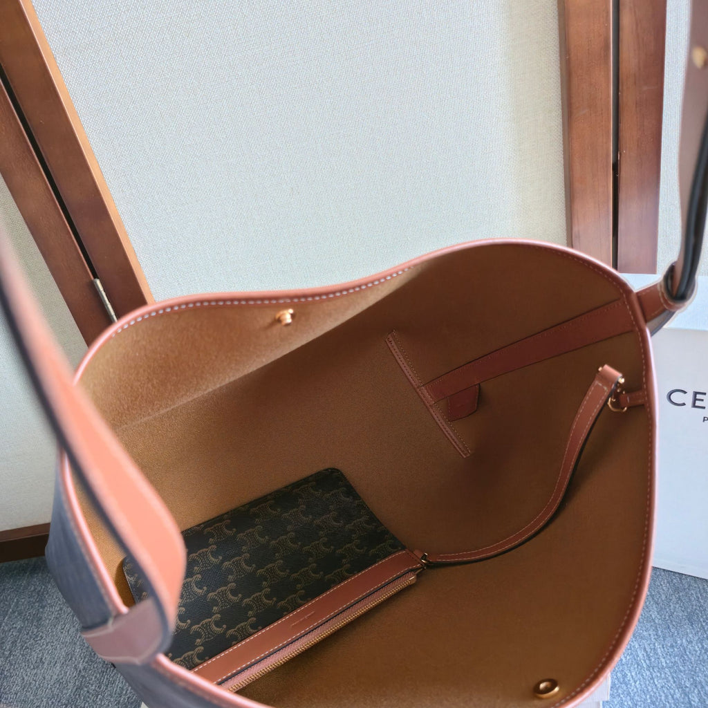 CELINE 25S SOFT SHOPPER BAG 32 IN BLACK TRIOMPHE CANVAS AND BROWN CALFSKIN